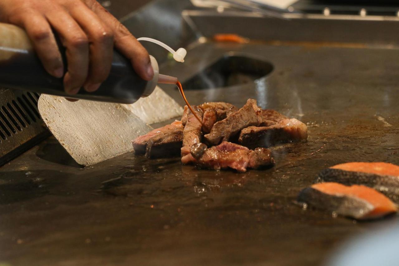 Chatrium Grand Bangkok Ngoại thất bức ảnh Soy sauce being used in cooking